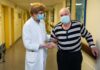 Ärztin mit Patient