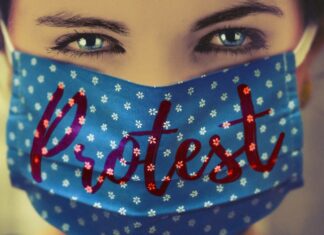 Weniger Teilnehmerinnen und Teilnehmer bei Versammlungen gegen Corona-Maßnahmen am Montagabend Protest mit Maske