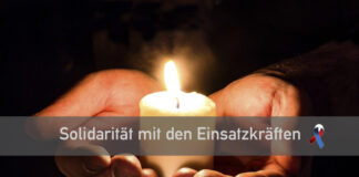 Hände halten eine Kerze