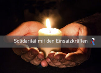 In eigener Sache: Mehr Solidarität mit Einsatzkräften Hände halten eine Kerze