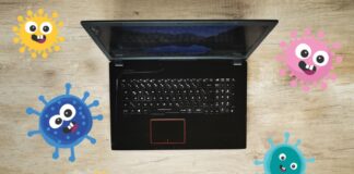 Laptop mit Corona-Grafiken