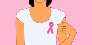 Grafik: Frau mit rosa Schleife am Shirt - Rosa Schleife internationales Symbol