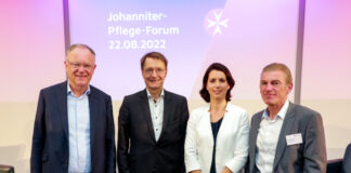 Johanniter im Gespräch mit Karl Lauterbach.