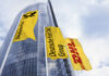 Symbolbild: Flaggen - Deutsche Post DHL Group