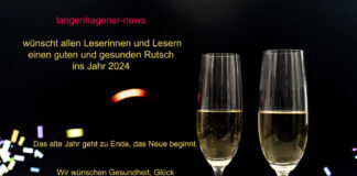 Foto von 2 Sektgläsern verbunden mit Neujahrswünschen