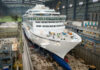 a large white ship in a building