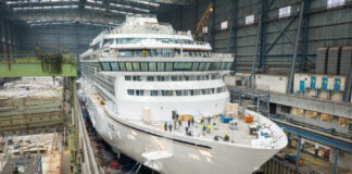a large white ship in a building