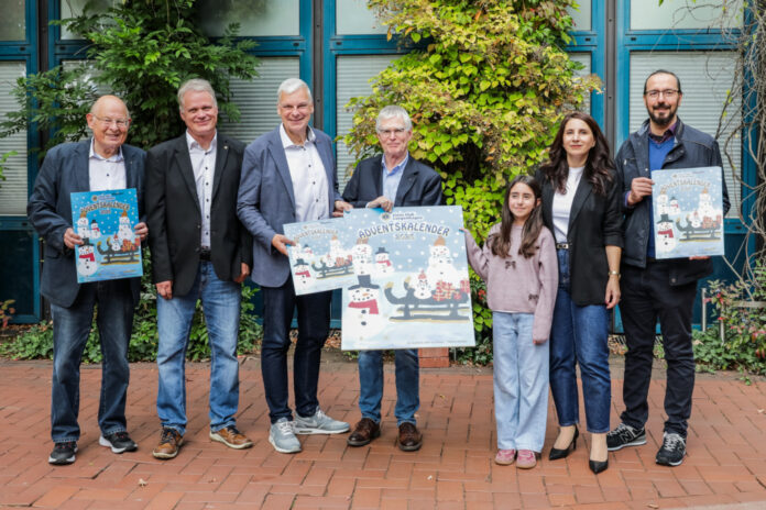 Lions Adventskalender 2026 Vorstellung des Siegerbildes des diesjährigen Lions-Adventskalenders.(vo.li.): Hans-Gerhard Knieß, Frank Baumgarten, Mirko Heuer, Wilhelm Hicking, Medeea Gombos (Künstlerin) mit Eltern Anca und Radu Gombos.