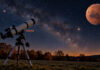 sternenhimmel und mars: zwei termine in langenhagen symbolbild: teleskop unter dem sternenhimmel mit symbolischer marsdarstellung - ki-generiert